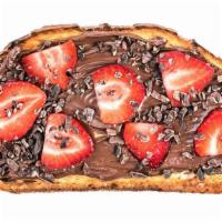 The Gigi Toast · Nutella, strawberries, and cacao nibs.