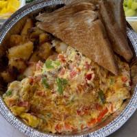 Western Omelette · Turkey ham, eggs, peppers and grilles onion and tomato.