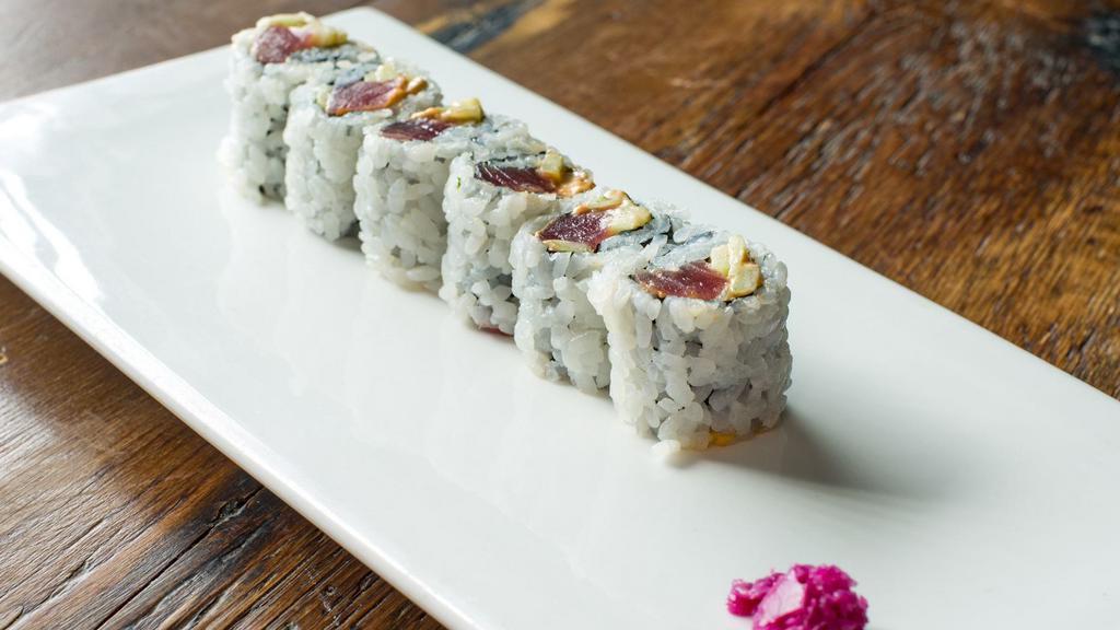 Spicy Tuna Roll · Six pieces cut maki roll. Yellowfin tuna, cucumber and spicy mayo.