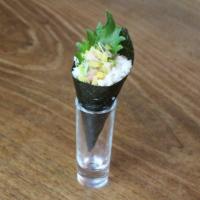 Spicy Scallop Handroll · Scallop with shiso mint and tempura flakes.