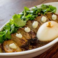 Pork Betty · Tender pork belly braised in sake and soy. Garnished with fresh cilantro and wasabi cream. S...