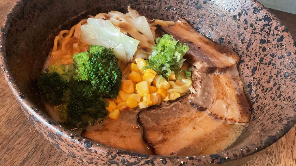 Spicy Miso Ramen · Sweet corn, cabbage, broccoli, scallion and pork belly chashu with ramen noodles.
