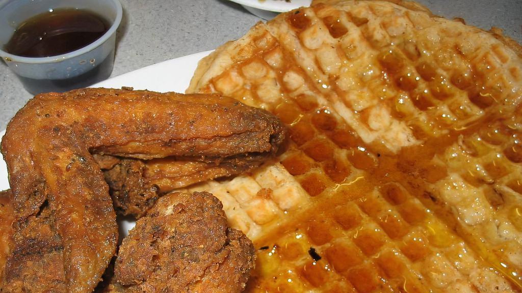 Chicken & Waffle · Classic Chicken & Waffle with butter and syrup.