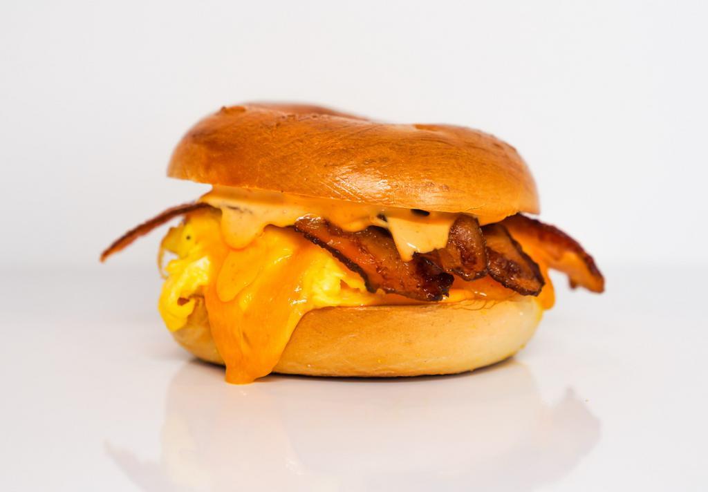 Bacon, Egg N Cheese · Your choice of bagel, two eggs, crispy bacon and melted cheese.