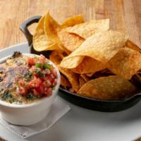 The Lewis · Vegetarian. Spinach, artichoke dip and house-made tortilla chips.