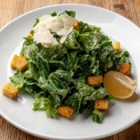 Classic Caesar Salad · Romaine and garlic croutons with parmesan dressing.