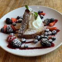 Butter Pound Cake · Fresh berries and whipped cream.