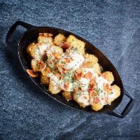 Loaded Bacon Tots · Tater tots with zesty truffle aioli and bacon crumble