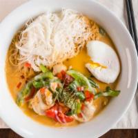 Panang Curry · Spices and herbs blended in chili paste with string beans, bell peppers, and kaffir lime lea...