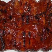 Side  Spicy Bbq  Chicken · Marinated BBQ Chicken with our special spicy sauce.
