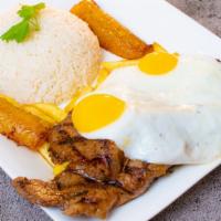 Bistec A Lo Pobre · Grilled steak served with fried eggs, French fries, plantains and rice.