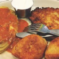 The Tieso · 2 fried pierogi, one stuffed cabbage and one potato pancake + cup of soup.