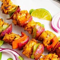 Chicken Tikka · Chicken cubes, marinated overnight in traditional spice & grilled. Served with fresh mint ch...