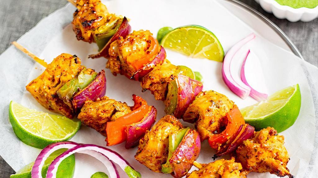 Chicken Tikka · Chicken cubes, marinated overnight in traditional spice & grilled. Served with fresh mint chutney