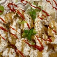 Shrimp Bowl Platter · Crispy fried shrimp on top of seasoned rice with lettuce, tomatoes, and pita.