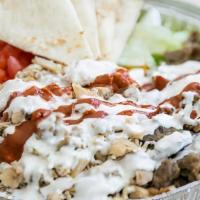 Chik & Gyro Mix Platter · Chicken shawarma & gyro on top of seasoned rice with lettuce, tomatoes, and pita