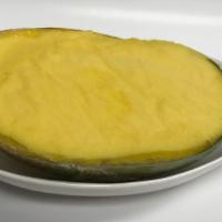 Mango Vegan Sorbet · Refreshing mango sorbet served in the natural fruit shell. (frozen).