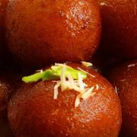 Gulab Jamoon · Sweet dumpling in cardamom flavored sugar syrup