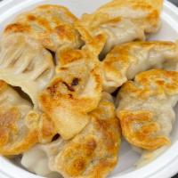 Fried Dumplings (8) · Pork dumpling.