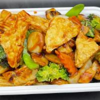 Bean Curd Home Style · Fried tofu with mix vegetables in brown sauce.