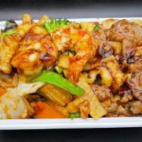 Happy Family · A combination of lobster meat (1), scallop, shrimp, beef, chicken, roast pork with mixed veg...