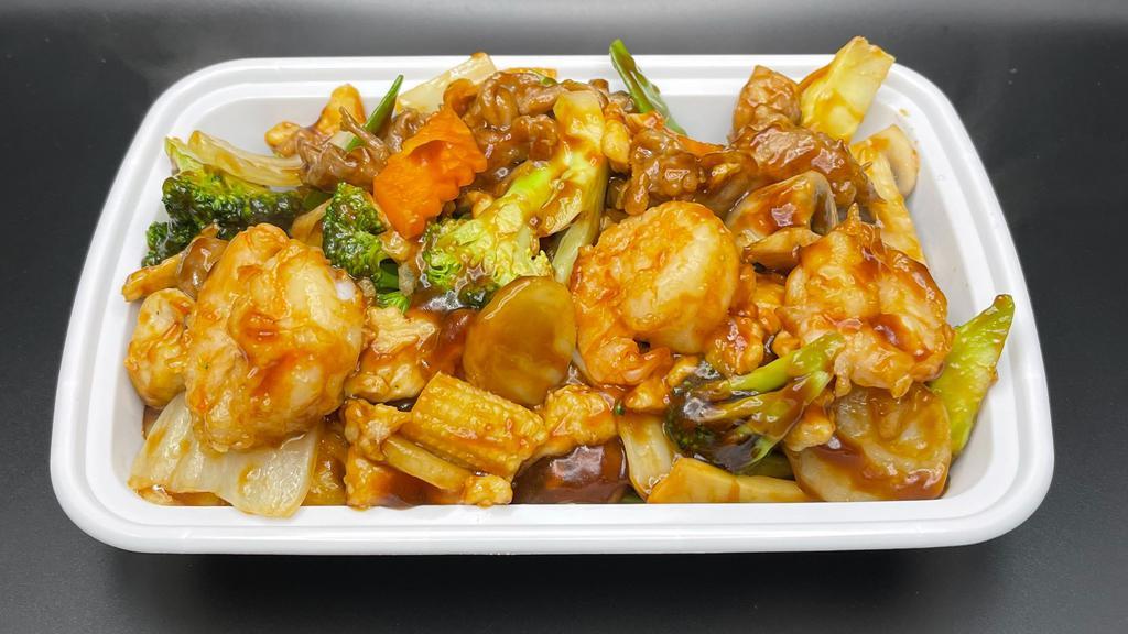 Triple Delight · Beef, shrimp and chicken with mixed vegetables in brown sauce.