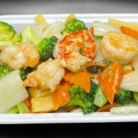 Seafood Combination · A combination of lobster meat (1), scallop and shrimp sautéed with vegetables in white sauce.