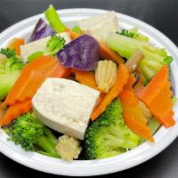 American Buddhist Delight · A healthful and colorful mixture of snow peas, broccoli, mushrooms, tofu, eggplant, carrots,...