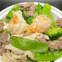 Gourmet Garden · Jumbo shrimp, chicken and beef slices with snow peas, straw mushrooms, broccoli, water chest...