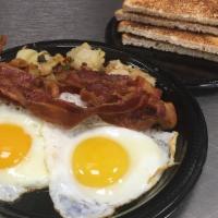Two Eggs Any Style With Bacon · Served with Home Fries & White Toast