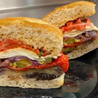 Roasted Garden Vegetables · Roasted red peppers, fresh basil, fresh mozzarella & sun-dried tomato with imported olive oil.