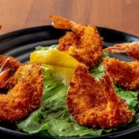 Bang Bang Shrimp · Perfectly seasoned 5 large breaded shrimps served with cocktails sauce and lettuce