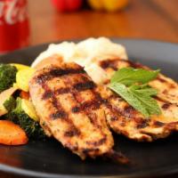 Chicken Butterfly Steak · Indulge in our fresh chicken breast filet, grilled with your choice of sauce served with 2 s...