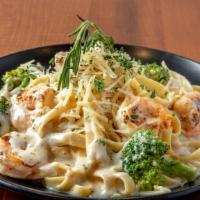 Shrimp Alfredo Pasta · Indulge in the cheesiness of our shrimp pasta, cooked in a rich, creamy, cheese sauce, tosse...