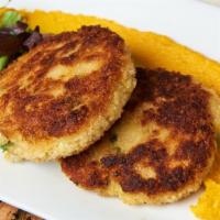 Maryland Style Crab Cakes · Fresh lump crabmeat coated with panko bread crumbs served with a lemon remoulade sauce