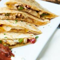 Chicken Quesadilla · Shredded marinated chicken, crispy bacon, scallions, and a three-cheese blend