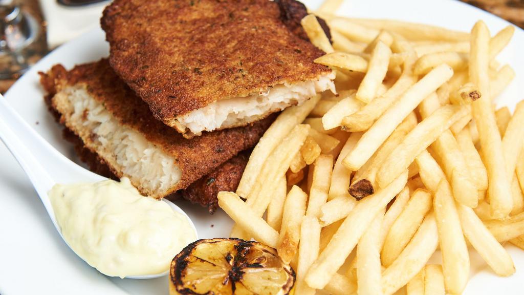 Fish And Chips · Hand-battered fried white fish served with tartar sauce & fresh lemon wedges