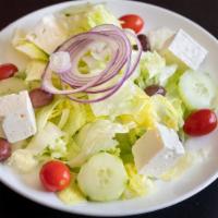 Greek Village Salad · Crumbled feta, kalamata olives, tomatoes, cucumbers, & onions with Greek vinaigrette.