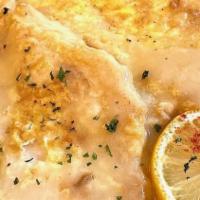Sole Francese · Egg-battered sole in a lemon and white wine sauce.