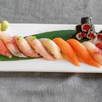 Sushi Deluxe · 9 pieces. Assorted sushi with tuna roll.
