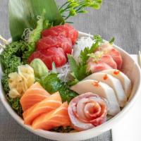Sashimi Deluxe · 21 pieces. Assorted raw fish.