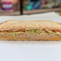 Tuna Melt · Tuna with melted cheddar cheese, lettuce & tomato.