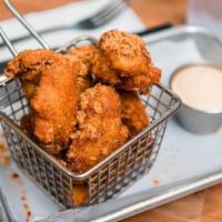 Chipotle Cinnamon Dry Rub Wings · A perfect combination of sweet and heat. Served with chipotle mayo dipping sauce.