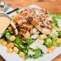 Caesar Salad With Grilled Chicken · Huge Portion. Romaine lettuce tossed in a classic Caesar dressing with croutons and shaved p...