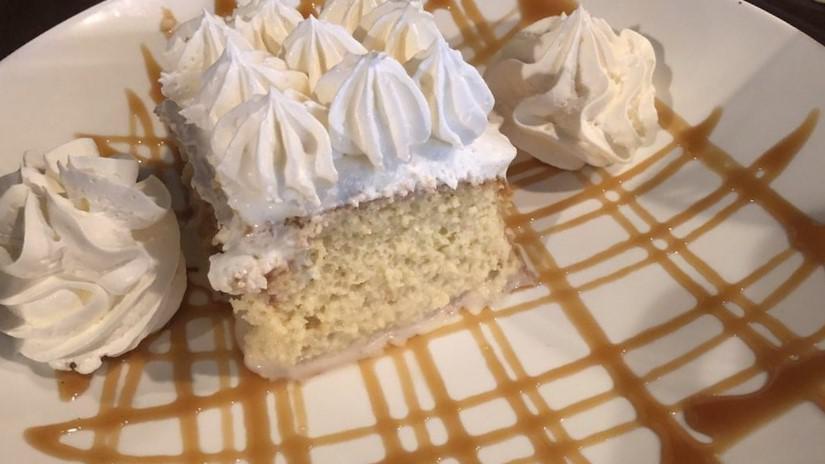 Tres Leches · Vanilla sponge cake drenched in a three milks, merengue, caramel.