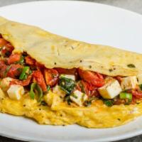 American Omelette · Fluffy & delicious Omelette prepared with three eggs and American cheese. Served with a side...