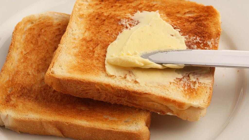 Buttered Toast · Golden-brown, buttered toast.
