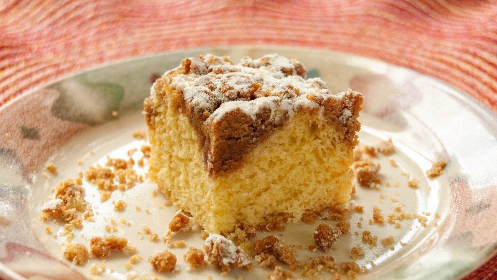 Crumb Cake · A rich, buttery cake topped with chunky crumbs.