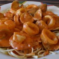 Seafood Diavolo Marinara · Shrimp, scallops, clams & mussels, served over linguini.