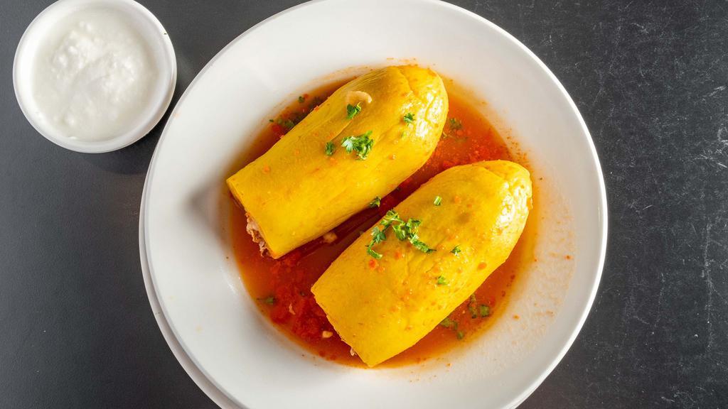 Stuffed Squash · Favorite. Summer squash stuffed with lamb and rice served in a tomato broth. Served with homemade yogurt.